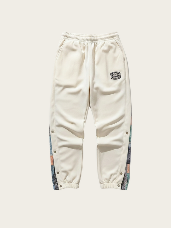 White sweatpants with colorful side panels on a white background