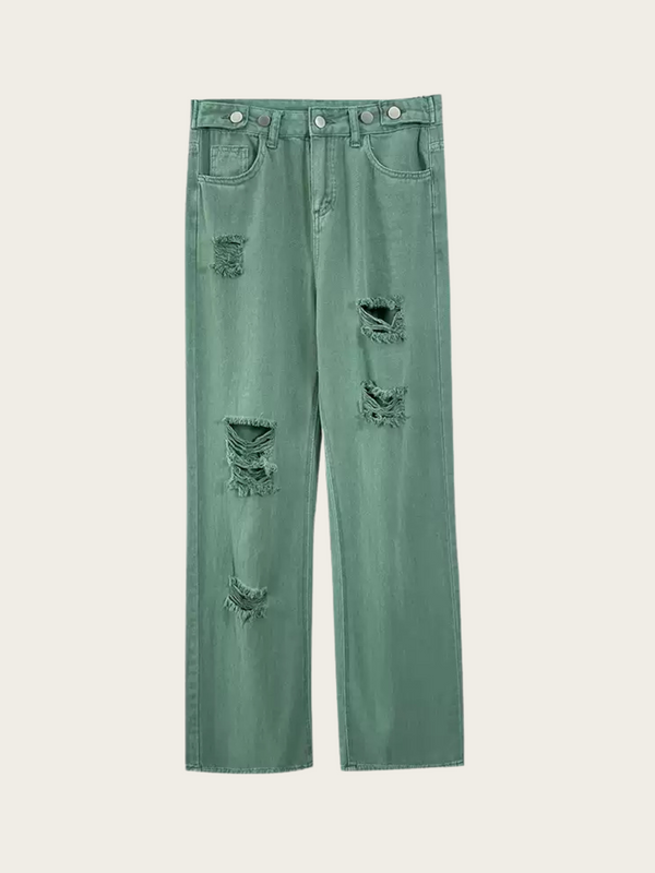 Green distressed jeans on a white background