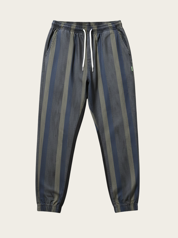 Striped pants with blue and gray stripes on a beige background