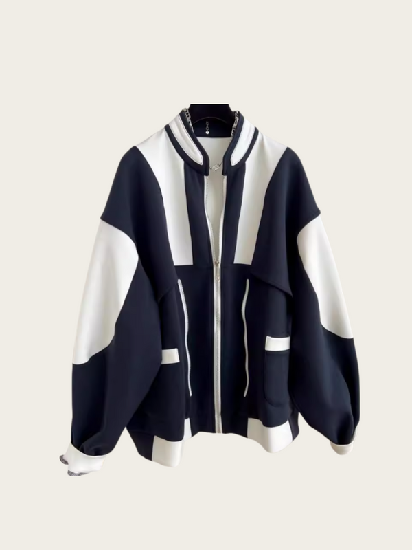 Navy and white jacket on a light gray background