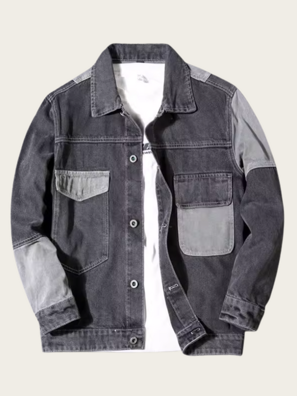 Denim jacket with patchwork design on a light beige background
