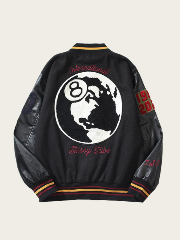 Black leather jacket with a globe design and text on a beige background