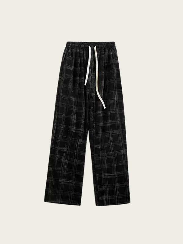 Black plaid pants with drawstring on a white background