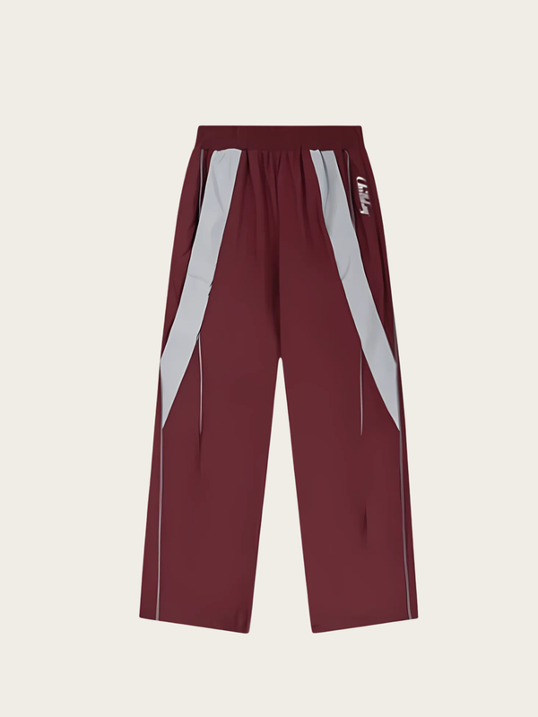 Maroon pants with white stripes on a beige background