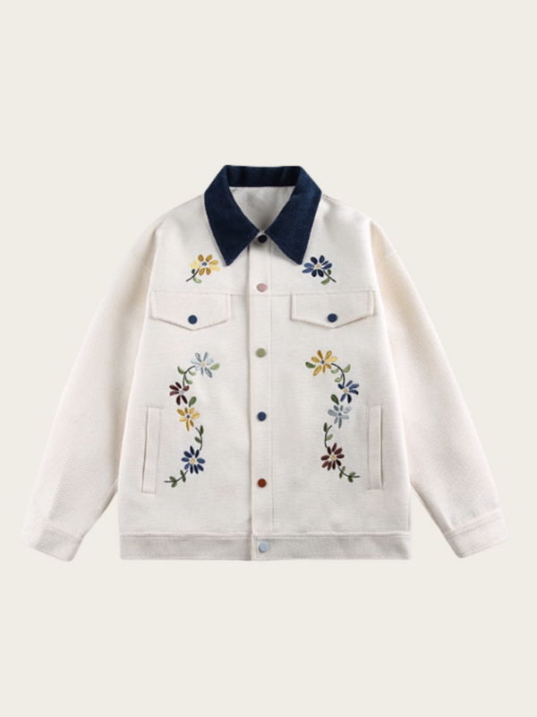 White jacket with floral embroidery on a white background