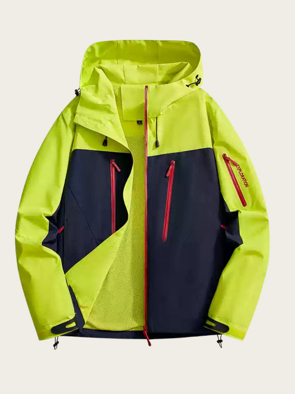 Two-tone yellow and navy jacket with red zippers on a light gray background