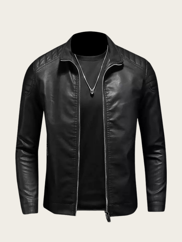 Black leather jacket on a light beige background