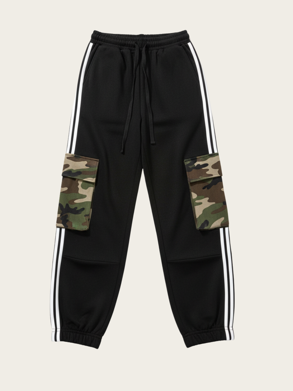 Black jogger pants with camouflage pockets and stripes on a beige background