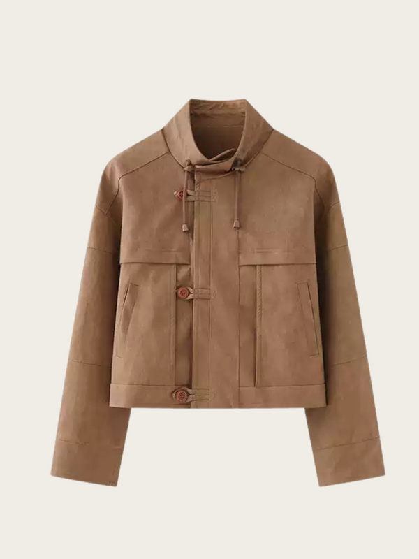 Brown jacket with button details on a beige background