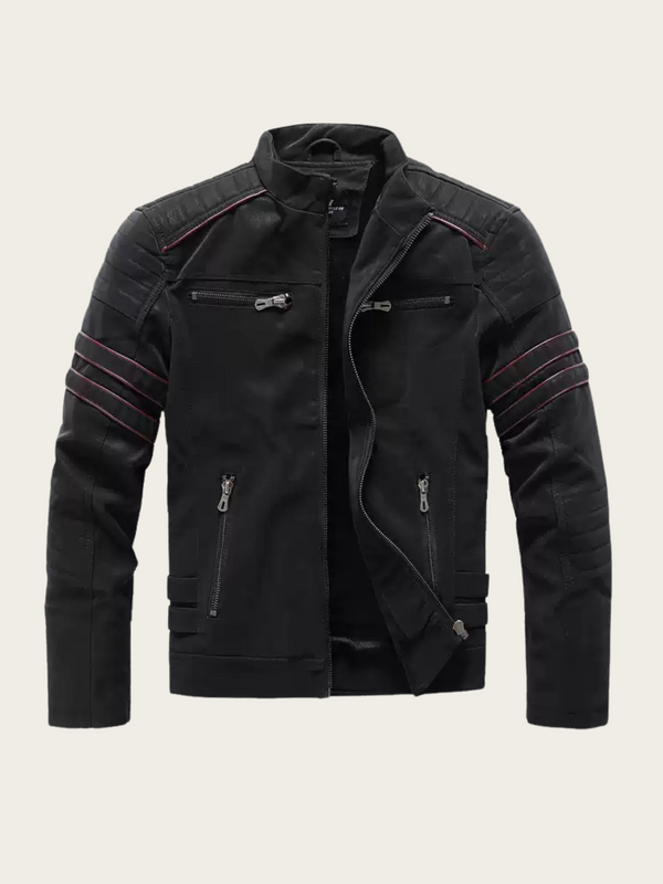 Black leather jacket with red stitching on a beige background
