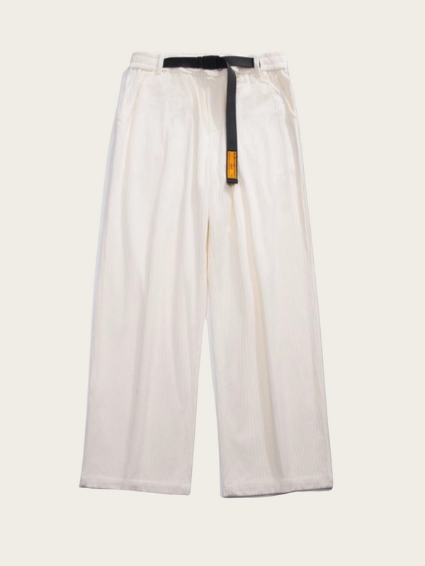 White wide-leg pants with a black belt on a light beige background