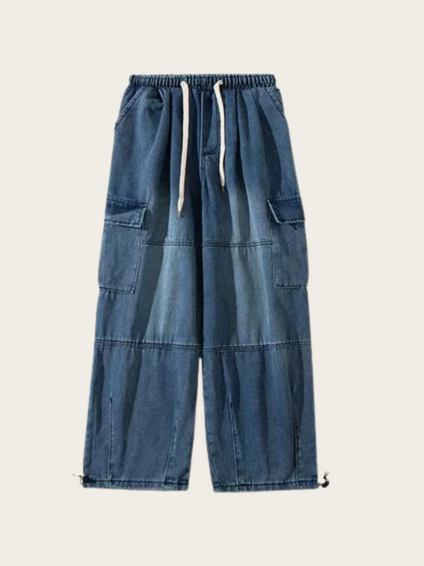 Blue denim wide-leg pants with drawstring on a light gray background