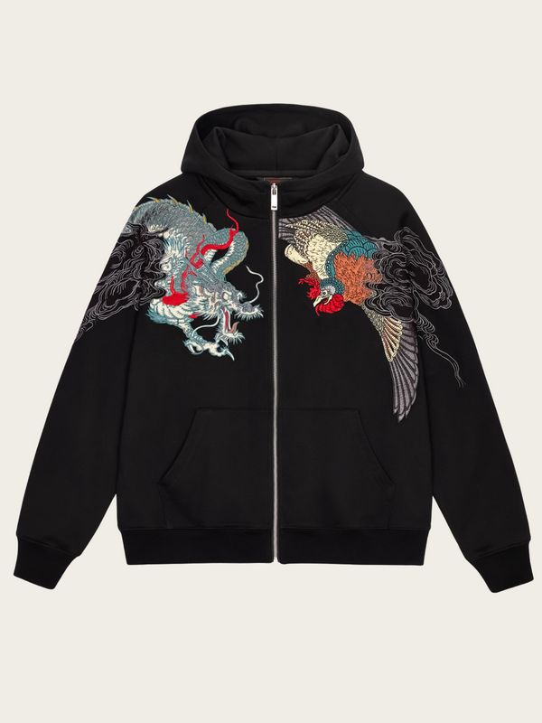 Black hoodie with dragon embroidery on a beige background