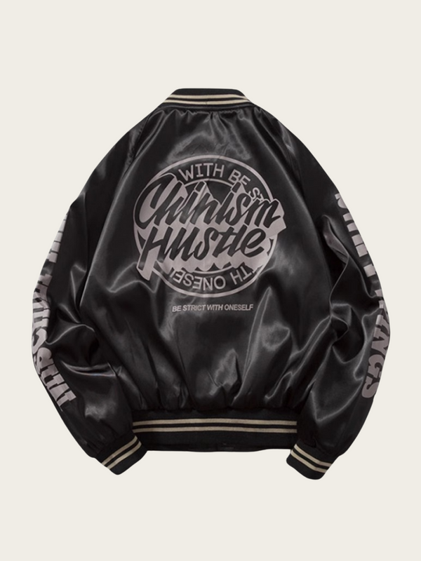 Black satin jacket with white text on a beige background
