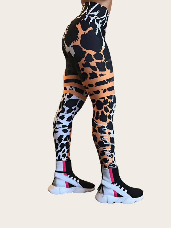 Animal print leggings worn by a person on a white background