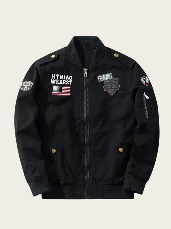 Black jacket with patches and branding on a light gray background