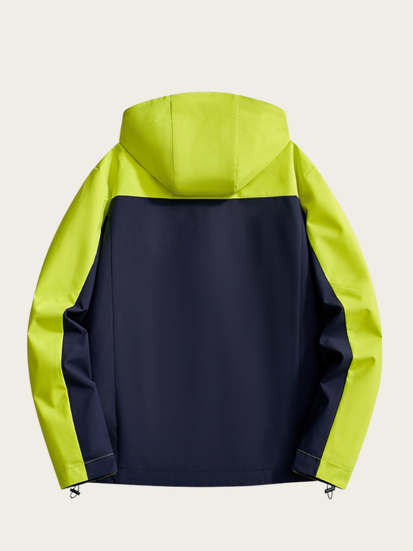 Back view of a two-tone jacket with bright green and navy blue sections on a beige background