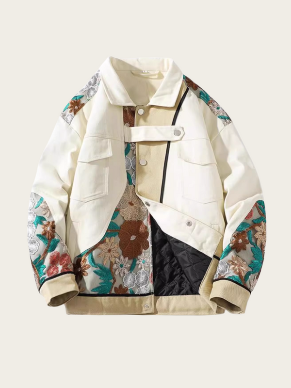 White jacket with floral patterned sleeves on a light beige background