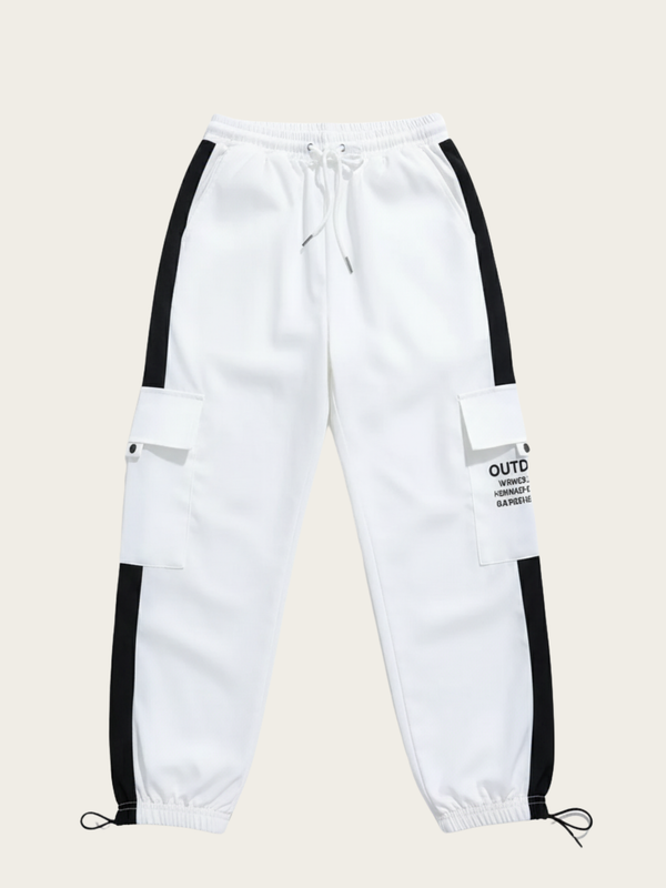White jogger pants with black accents on a beige background