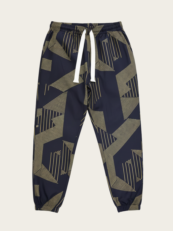 Navy jogger pants with geometric pattern on a beige background