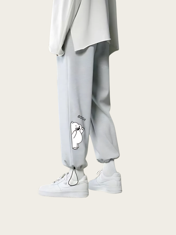 Light gray sweatpants with a small white graphic on a white background