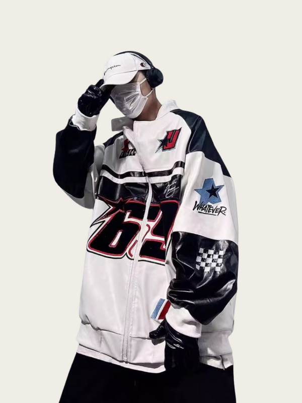 Person wearing a colorful jacket with various designs and text on a white background