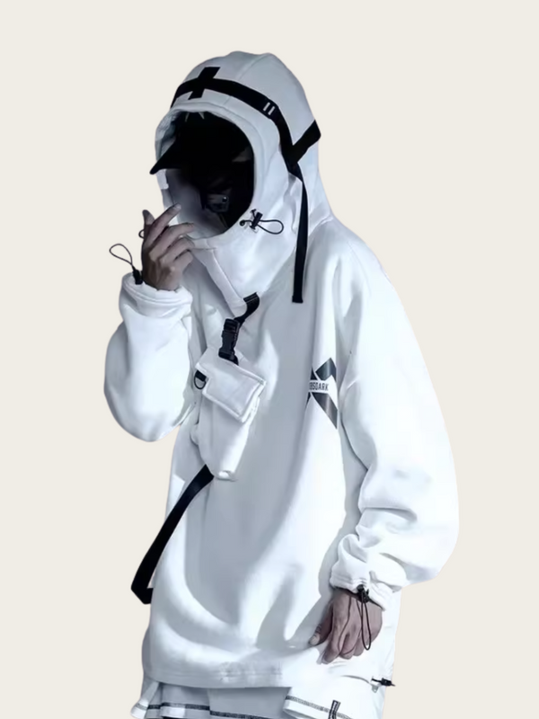 Person wearing a white beekeeping suit with a hood on a beige background