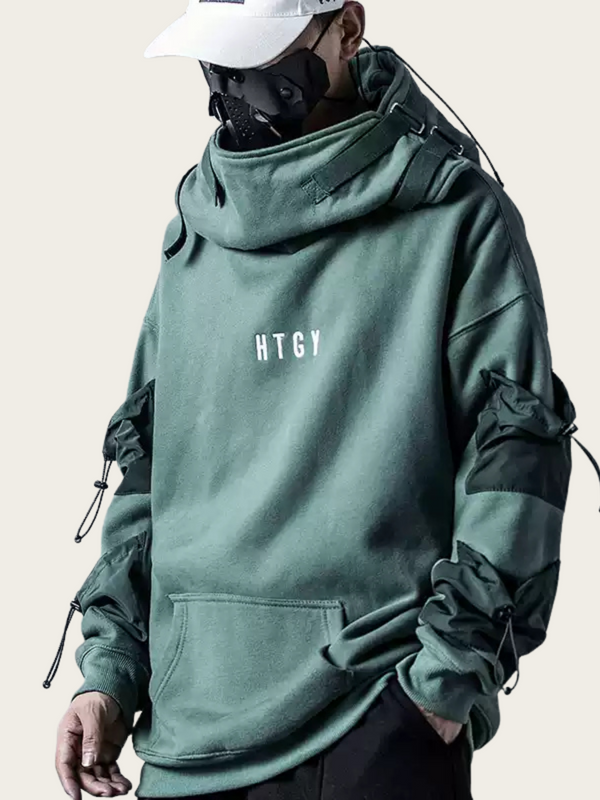 Person wearing a green hoodie with 'HTGy' branding on a light gray background