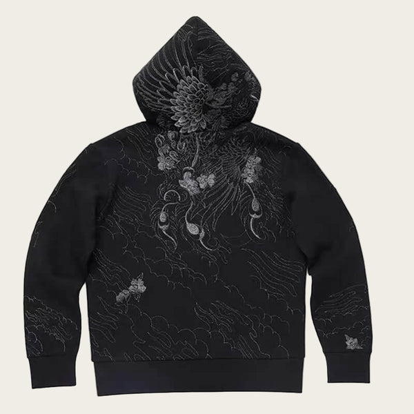 Black hoodie with intricate floral embroidery on a white background