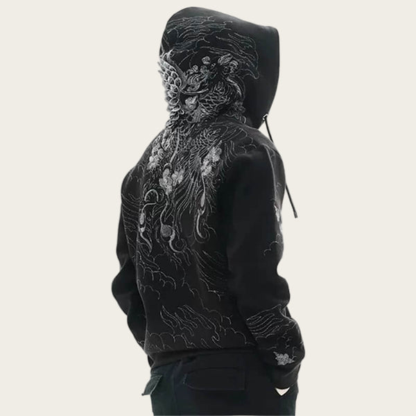Black hoodie with intricate white designs on a white background