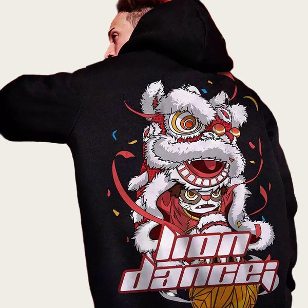 Person wearing a black hoodie with a colorful lion dance design on the back.