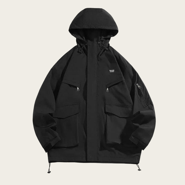Black hooded jacket with multiple pockets on a white background
