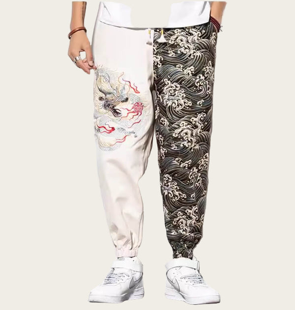 Two pairs of pants with different designs worn by a person on a yellow background