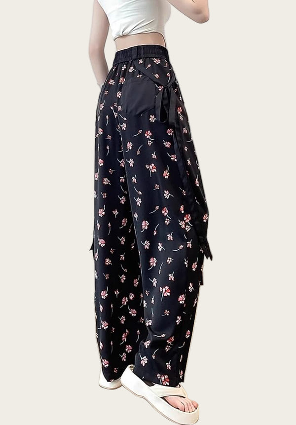 Person wearing navy floral pants