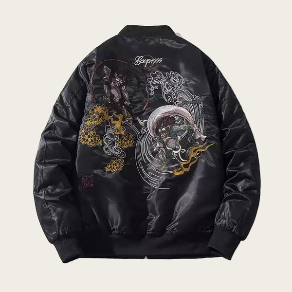 Black jacket with intricate designs and text on a white background