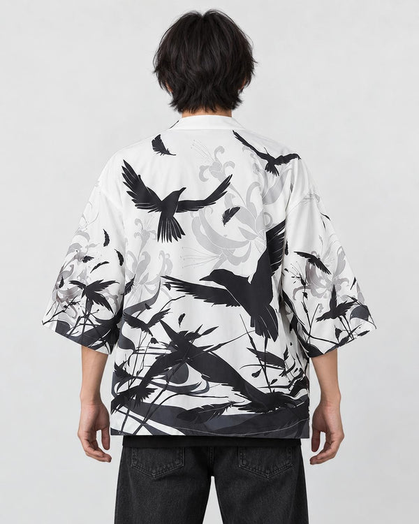 Model wearing the white haori cardigan with black ink-wash birds printed across the back, back view
