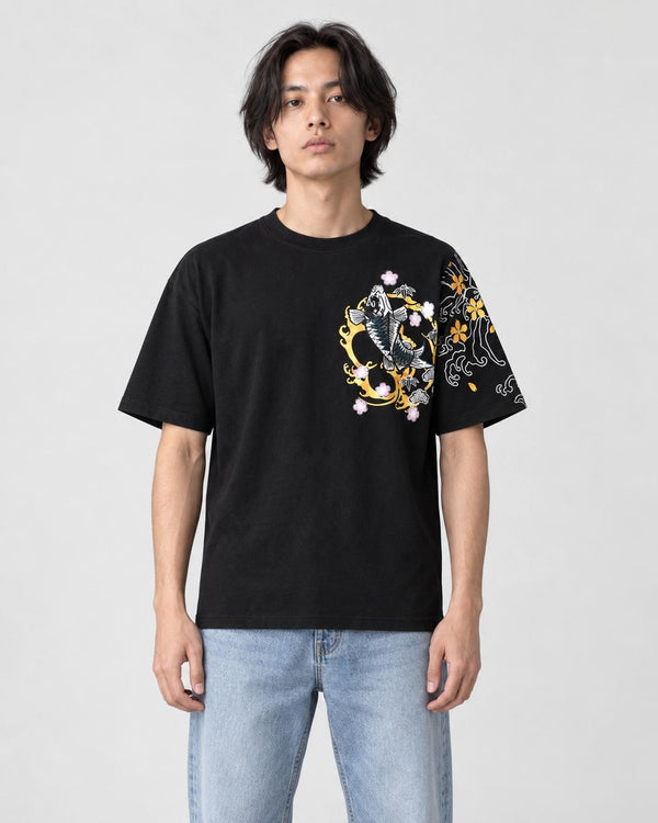 Man in the black T-shirt with a koi in a gold ring on the left chest and wave sleeve, jeans and white sneakers