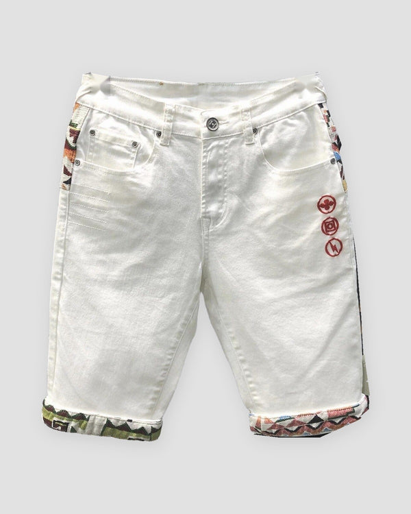 White denim shorts with three red embroidered icons on the thigh and jacquard-lined cuffs, front view