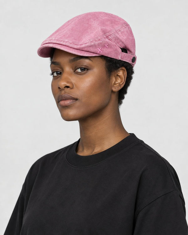 Woman wearing the pink washed flat cap, three-quarter view