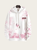 White hoodie with pink floral pattern on a white background