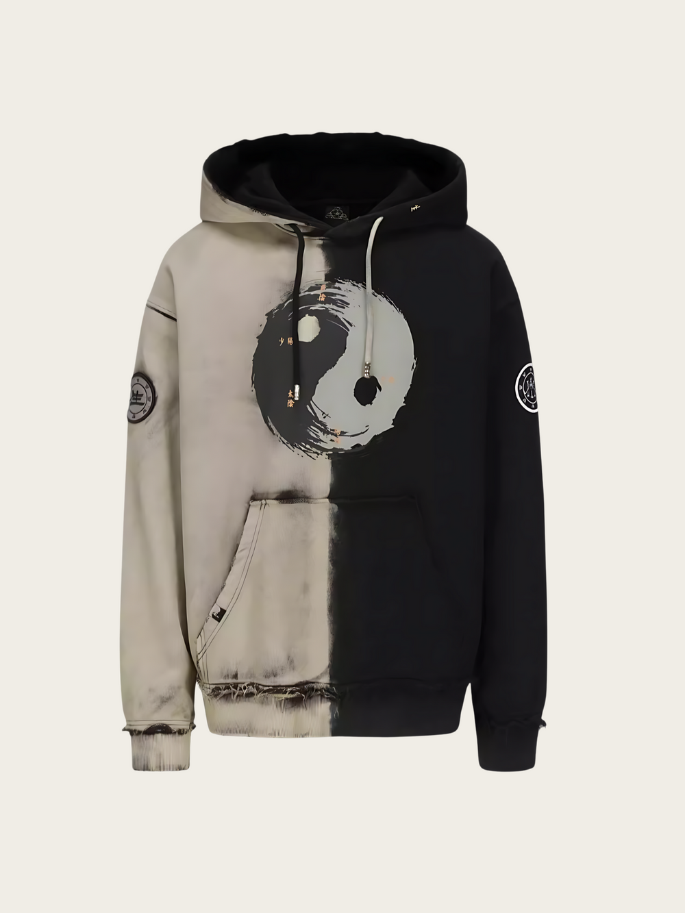 Hoodie with a black and white design on a beige background