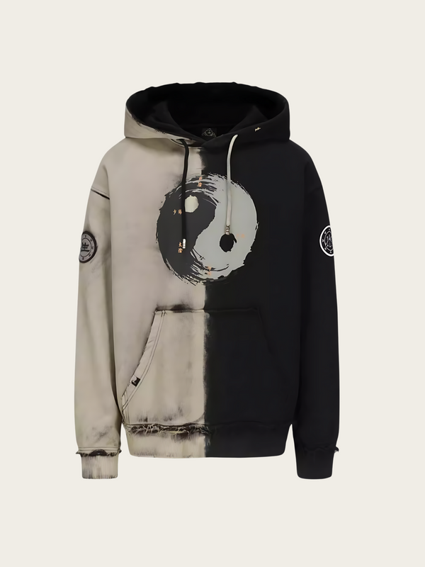 Hoodie with a black and white design on a beige background