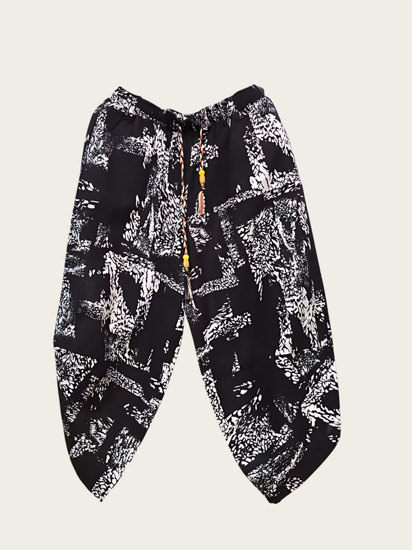 Black and white patterned pants on a light gray background