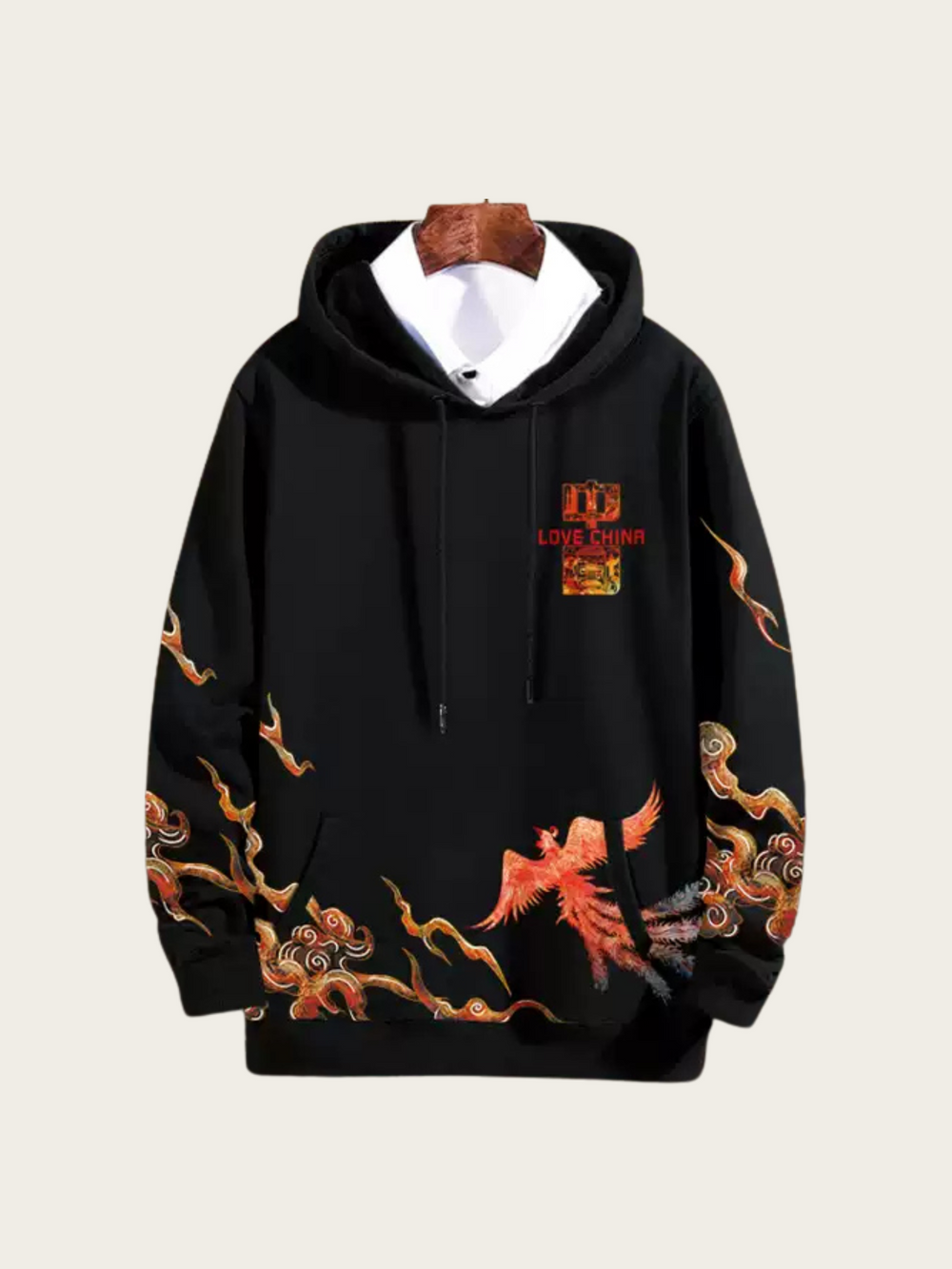 Black hoodie with dragon designs and a brand logo on a white background