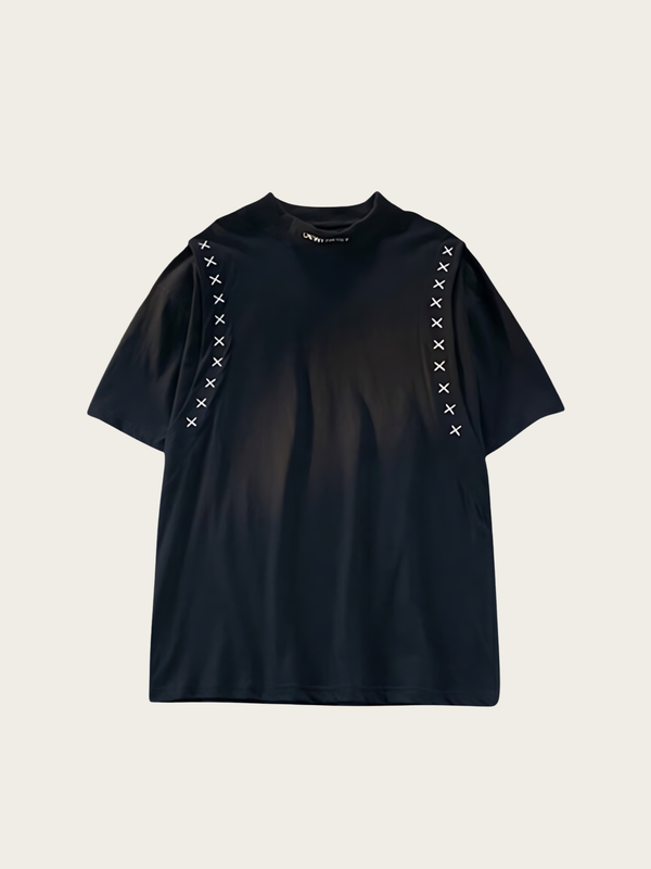 Black t-shirt with lace-up details on a beige background