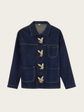 Dark blue denim jacket with button details on a light beige background