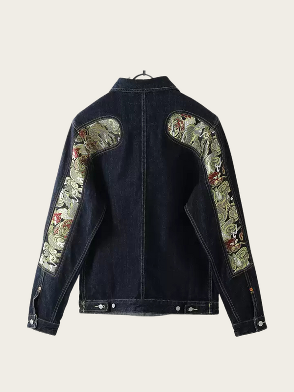 Denim jacket with floral embroidery on a beige background