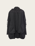 Black hooded jacket on a beige background
