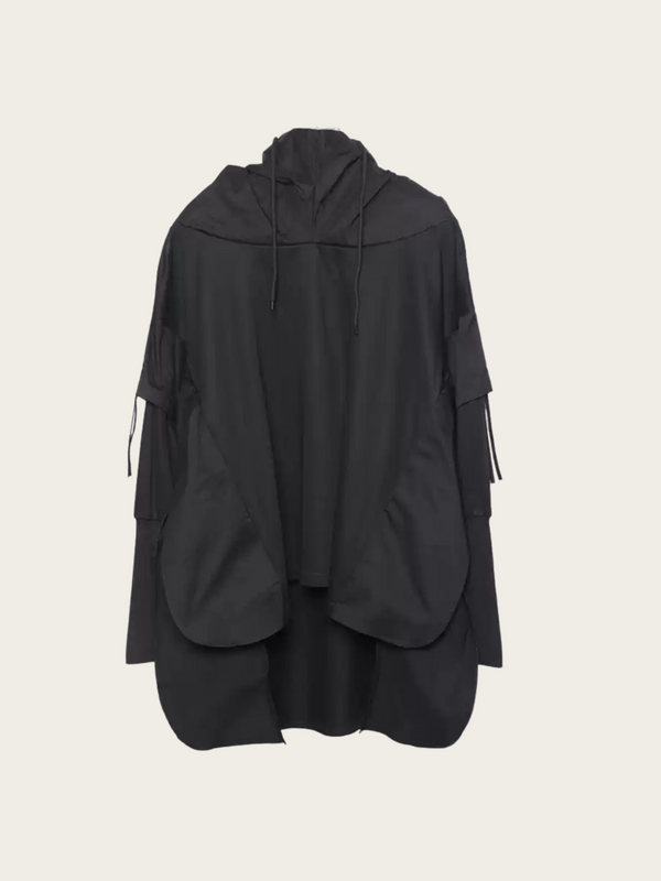Black hooded jacket on a beige background