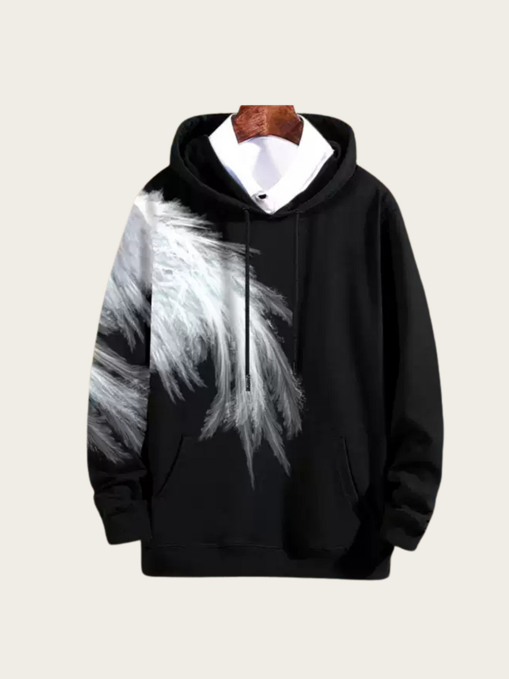 Black hoodie with white feather design on a beige background